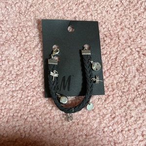 Black bracelet with silver dragonflies